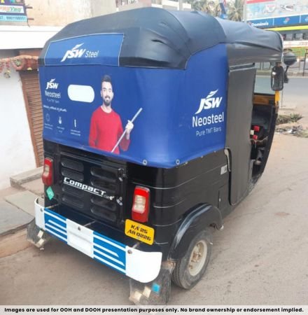 Transit advertising on auto rickshaw with rear hood branding display