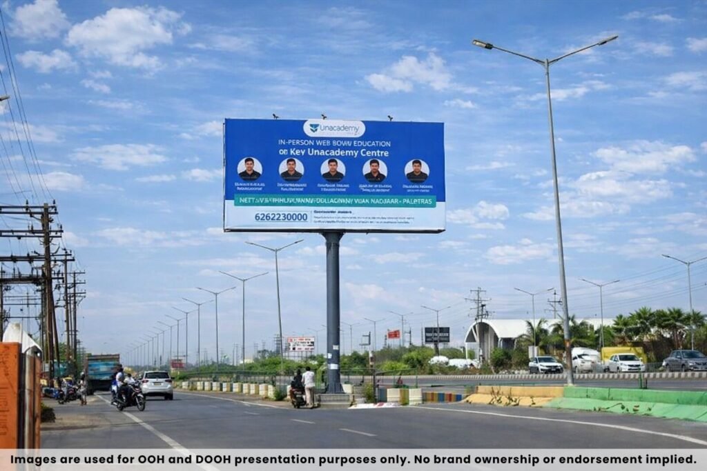 Education institute advertising on large highway unipole billboard reaching long distance vehicle traffic