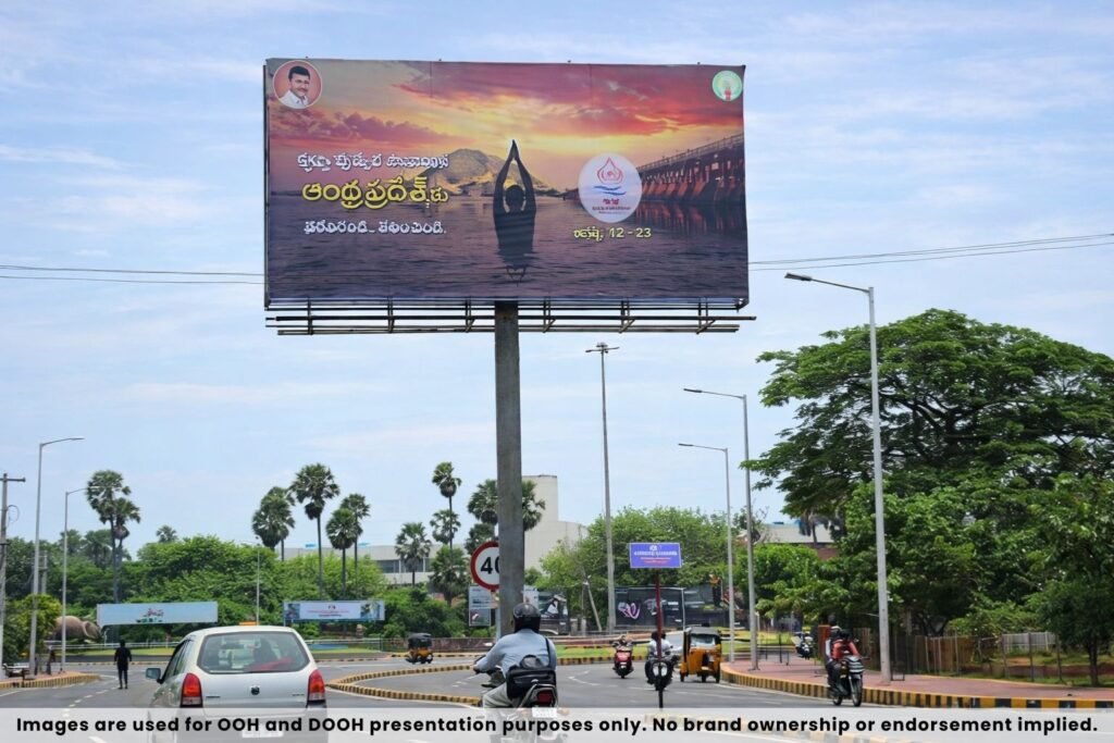 Large unipole hoarding advertisement installed at busy city junction with heavy traffic outdoor advertising display